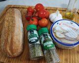 A picture of step 1 of Baked Camembert with Confit Tomatoes and Garlic Bruschetta.