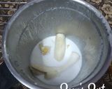 A picture of step 1 of 2 minutes Pineapple Banana Coconut Milk Smoothie.