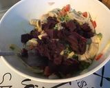 Une image de l'étape 13 de Salade marinée de pommes de terre, patates douces violettes, harengs, tomates et poivron.