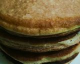 A picture of step 8 of Banana pancakes with chocolate ganache topping.
