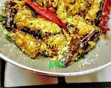 A picture of step 6 of Vangi bhat (brinjal rice).