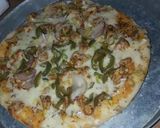 A picture of step 7 of Chickn tikka pizza.
