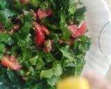 A picture of step 3 of Spinach tomato salad.