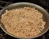 A picture of step 8 of Toasted Butter Pecan Layer Cake with Whipped White Chocolate Cream.