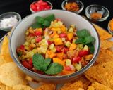 A picture of step 4 of Grilled pineapple and mango salsa.