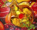 A picture of step 7 of Bata Fish (Reba Carp) with baby pumpkin in a light gravy.