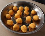 A picture of step 3 of Sesame ball with salted egg custard.