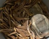 A picture of step 1 of Kadali Fula Bhaja (Banana Flower fry).