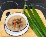 A picture of step 1 of Chinese Sausage In Coconut milk.