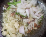 A picture of step 2 of Kanda Poha.