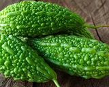 A picture of step 1 of BITTER GOURD (KARELA) PITLAI.