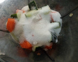 A picture of step 2 of Carrot and cucumber juice.