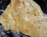 A picture of step 3 of Anday wali tawa cooked roti.