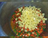 A picture of step 4 of Mix veg zeera rice.