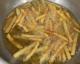 A picture of step 3 of Masala fries 🍟.