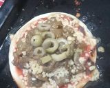 Foto del paso 7 de la receta: Pizzitas de berenjena, tomate, cebolla y queso