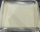 Foto del paso 3 de la receta: Empanada de espinacas, requesón y pavo 🍴🥟