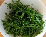 A picture of step 1 of Arugula Salad.