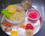 A picture of step 1 of Kathiyavadi lunch :Fresh lobiya Curry, Roti, Cucumber Slices, Pickle & buttermilk.