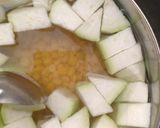 A picture of step 1 of Bottle gourd and split chickpeas curry.