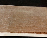 A picture of step 16 of Chocolate Strawberry Ice Cream Cake Roll.