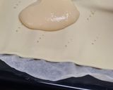 Foto del paso 5 de la receta: 179. Coca de San Juan de hojaldre, crema y piñones