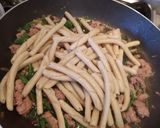Foto del passaggio 5 della ricetta Maccheroni al ferretto con salsiccia grana e rucola