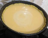 Foto langkah ke 5 dari resep Pie Susu Teflon Rasa Es Kelapa Jeruk.