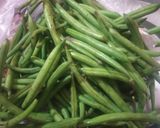 A picture of step 2 of Beans aloo bhaji.