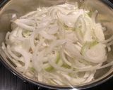 A picture of step 3 of Roasted heirloom and caramelized onion red sauce.