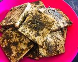A picture of step 1 of Tofu fry in single garlic with curry leaves powder.