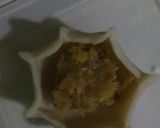 A picture of step 3 of Rice modak.