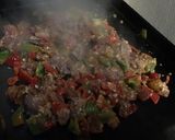 A picture of step 14 of Beef with Peanuts, Peppers, and Ginger.