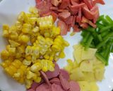A picture of step 2 of Fried Instant noodles loaded with Sausages and vegies.