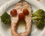 A picture of step 4 of Baked Salmon with Cherry Tomatoes, Garlic, Olive Oil, and Parsley.