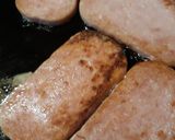 A picture of step 4 of Folded Browned Folded Eggs with Spam Sandwich.
