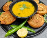 A picture of step 9 of Spiral Baati with Dal.
