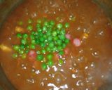 A picture of step 11 of Cuby Chicken Pasta.