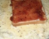 A picture of step 2 of Egg Wraped Sandwich.