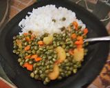 A picture of step 8 of Minji stew served with white rice.