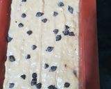 A picture of step 7 of Strawberry Banana Bread with Walnuts.