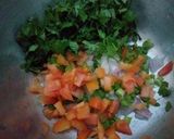 A picture of step 3 of Chicken Omlate covered sandwiches.