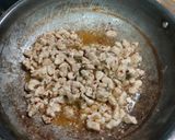 A picture of step 4 of American chopsuey with fried rice.
