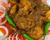 A picture of step 10 of Chicken Tandoori Masala with Paratha.