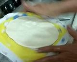A picture of step 1 of White sorghum chapati on clay tawa.