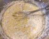A picture of step 3 of Basic Crepe with strawberry banana Nutella spread.