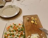 Foto del paso 4 de la receta: Ensaladilla con Calamar, infusión Marina y Piquillos al Ajillo