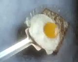 A picture of step 4 of Sunny side up sandwich.