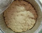 A picture of step 1 of Cheesecake with crumbles.