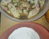 Foto del paso 4 de la receta: Alitas y muslitos de pollo fritos